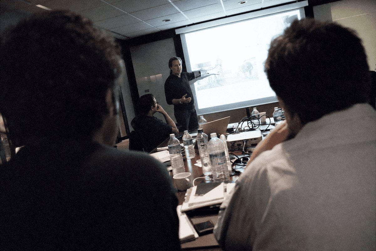 Distributor pitch meeting seen across a conference table